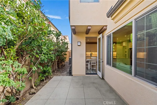 front view of a house with a garden