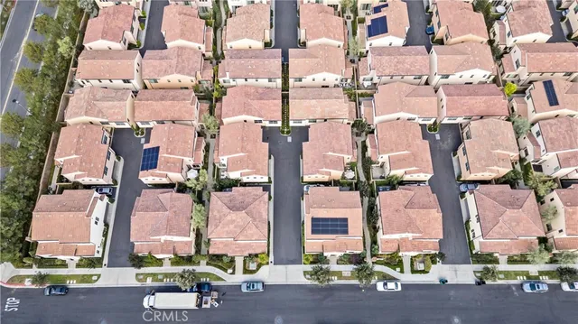 an aerial view of city and ocean