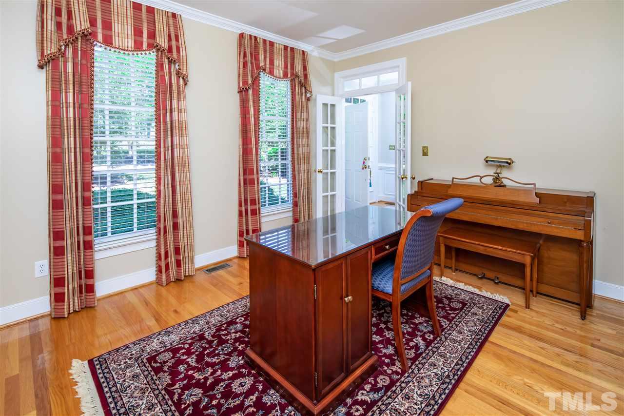 2709 Amstel Way Raleigh, NC 27613 - Photo 4 of 30 a room with furniture and a rug