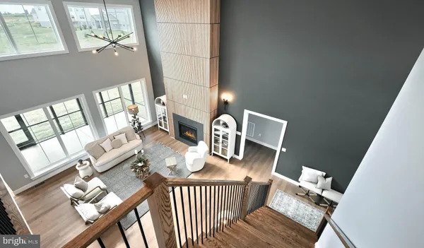 view of living room and dining room with wooden floor