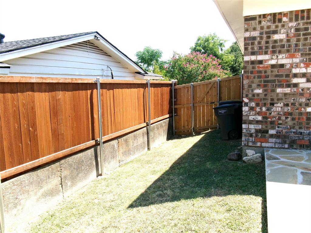 4204 Burke Road Fort Worth, TX 76119 - Photo 35 of 35 Rear Side Yard
