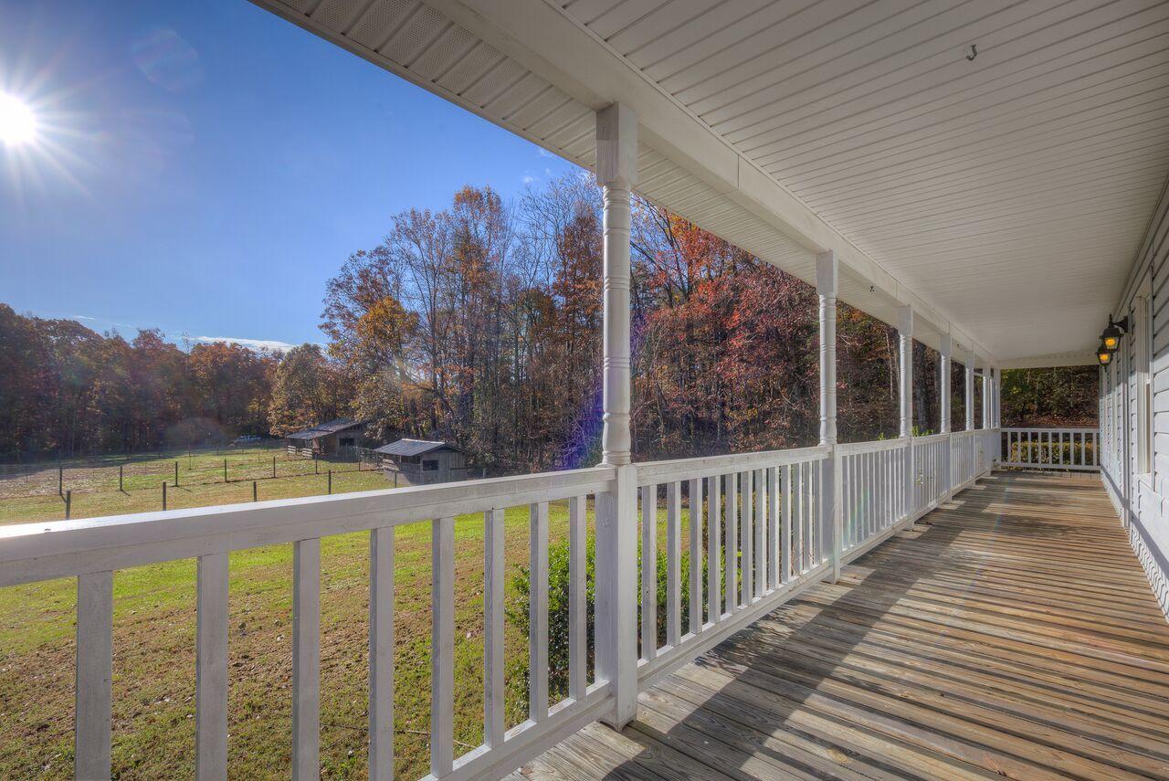 224 Shade Hollow Road Blue Ridge, VA 24064 - Photo 2 of 38 a view of a balcony with furniture