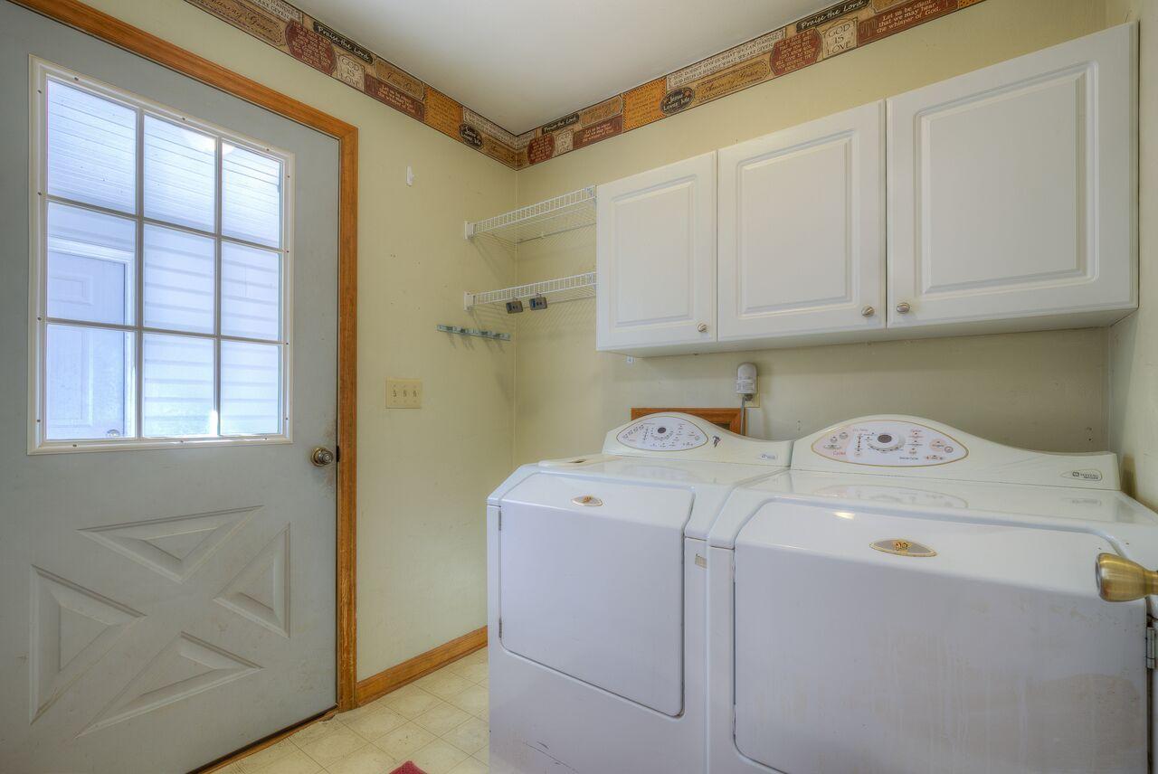 224 Shade Hollow Road Blue Ridge, VA 24064 - Photo 12 of 38 a utility room with dryer and washer