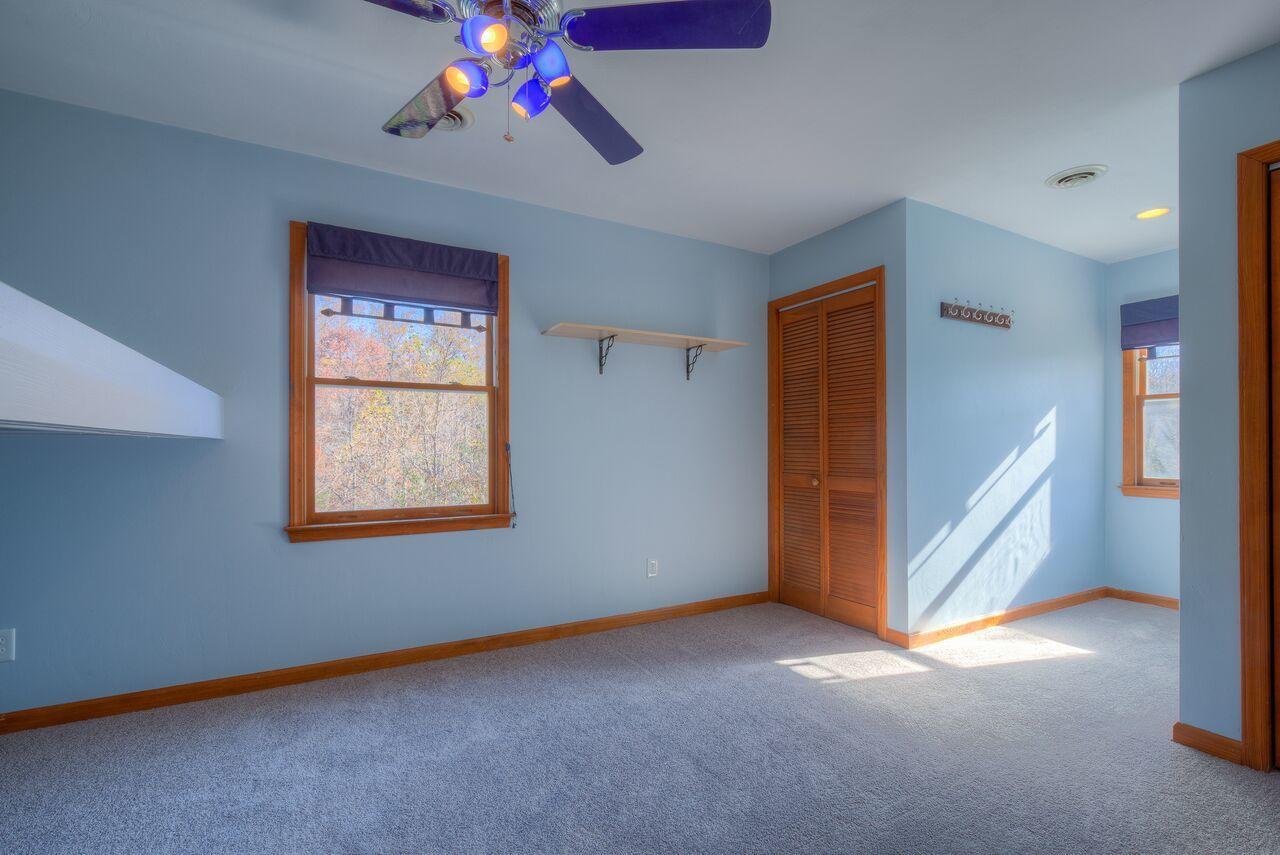 224 Shade Hollow Road Blue Ridge, VA 24064 - Photo 18 of 38 a view of an empty room with a window