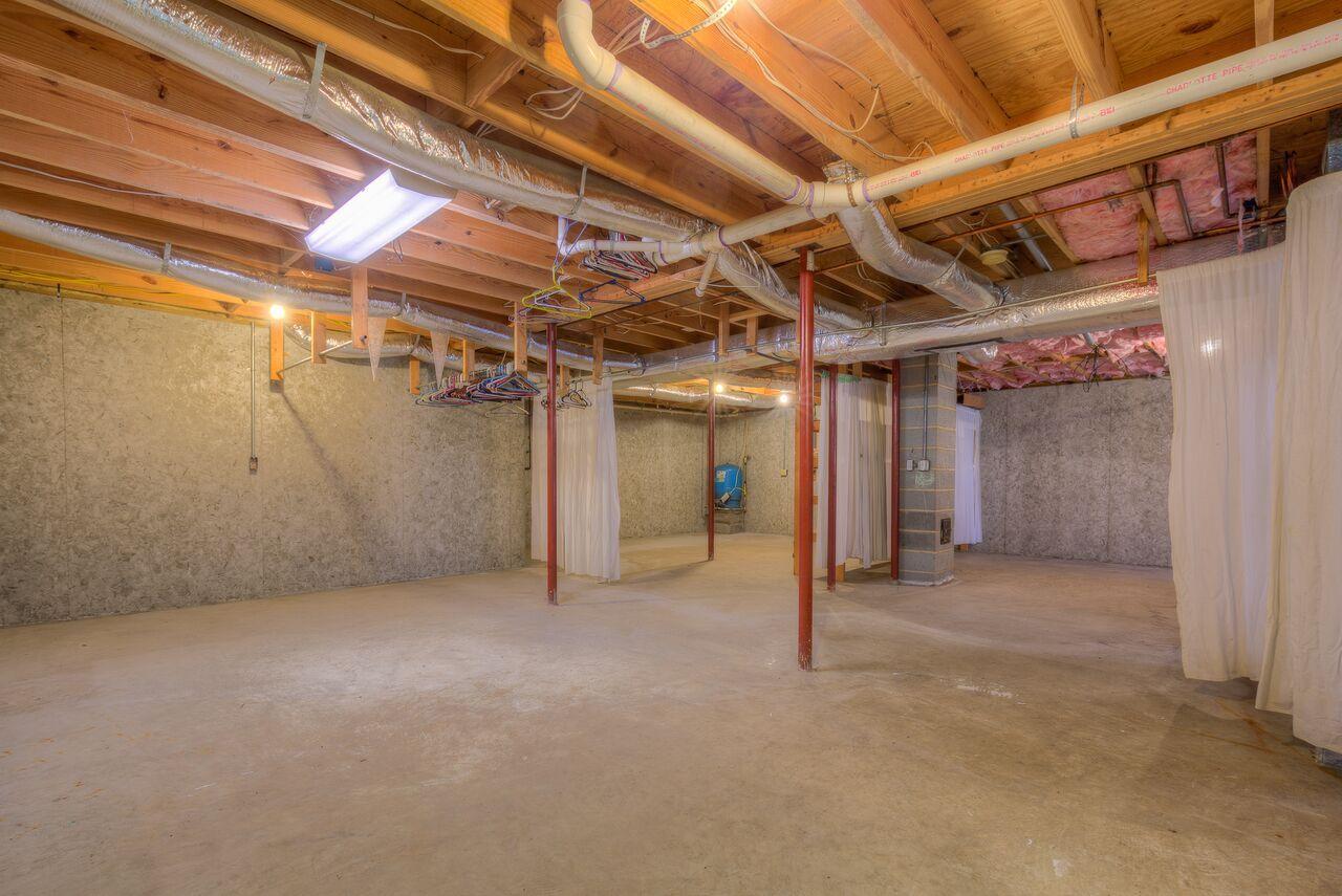 224 Shade Hollow Road Blue Ridge, VA 24064 - Photo 24 of 38 a view of big room with an empty space