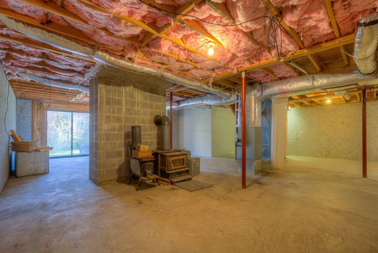 224 Shade Hollow Road Blue Ridge, VA 24064 - Photo 26 of 38 a view of a room with wooden floor and furniture