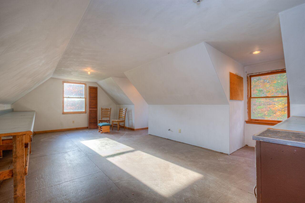 224 Shade Hollow Road Blue Ridge, VA 24064 - Photo 29 of 38 an empty room with windows
