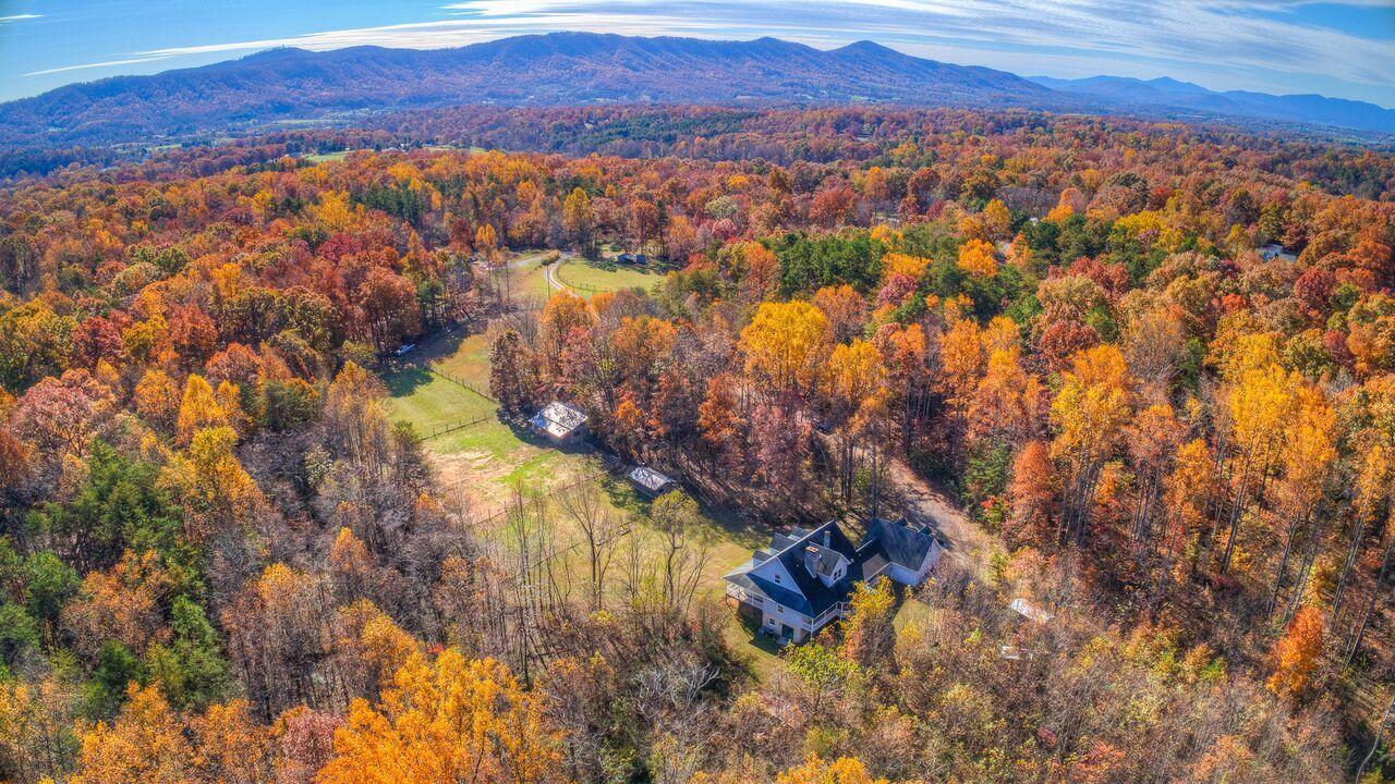 224 Shade Hollow Road Blue Ridge, VA 24064 - Photo 36 of 38 a view of lake and mountain