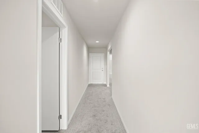 a view of storage and utility room with a sink