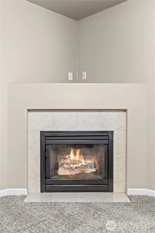 a fireplace with a clock on it