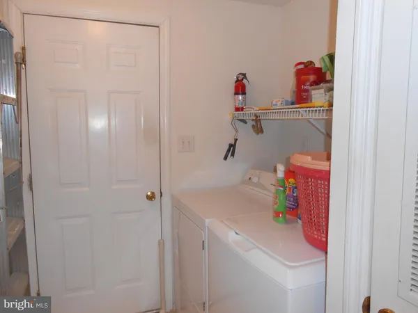 a room with a bed and a flat screen tv