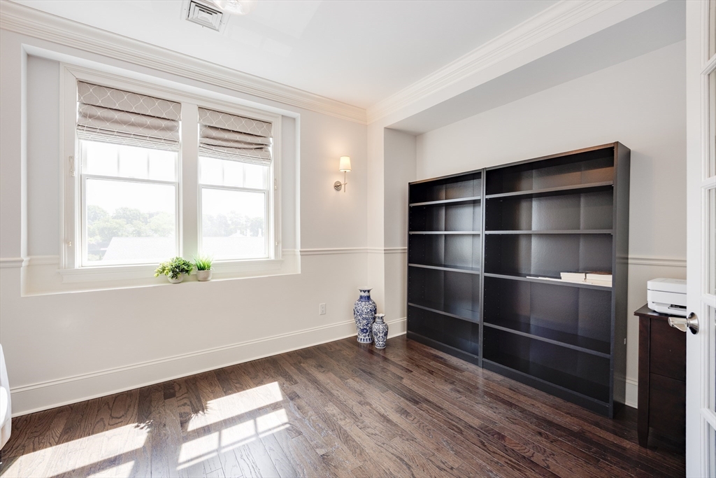 66 Simons Road, Unit C Mashpee, MA 02649 - Photo 27 of 42 a view of an empty room with a window