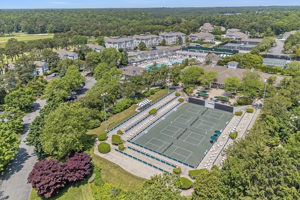 66 Simons Road, Unit C Mashpee, MA 02649 - Photo 36 of 42 an aerial view of residential houses with outdoor space and river