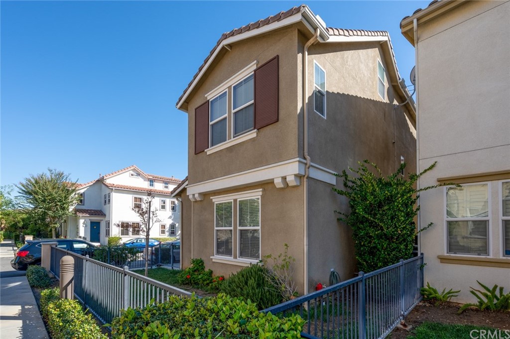 106 Tiger Lane Placentia, CA 92870 - Photo 2 of 35 a front view of house and yard with beautiful flowers