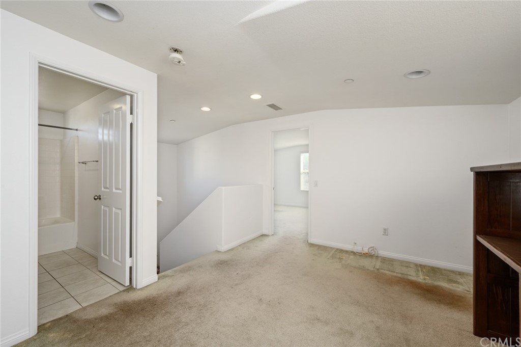 106 Tiger Lane Placentia, CA 92870 - Photo 32 of 35 a view of a livingroom with wooden floor and staircase