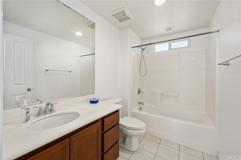106 Tiger Lane Placentia, CA 92870 - Photo 34 of 35 a bathroom with a shower sink vanity mirror and toilet