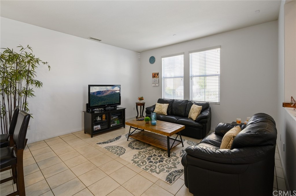 106 Tiger Lane Placentia, CA 92870 - Photo 6 of 35 a living room with furniture and a flat screen tv