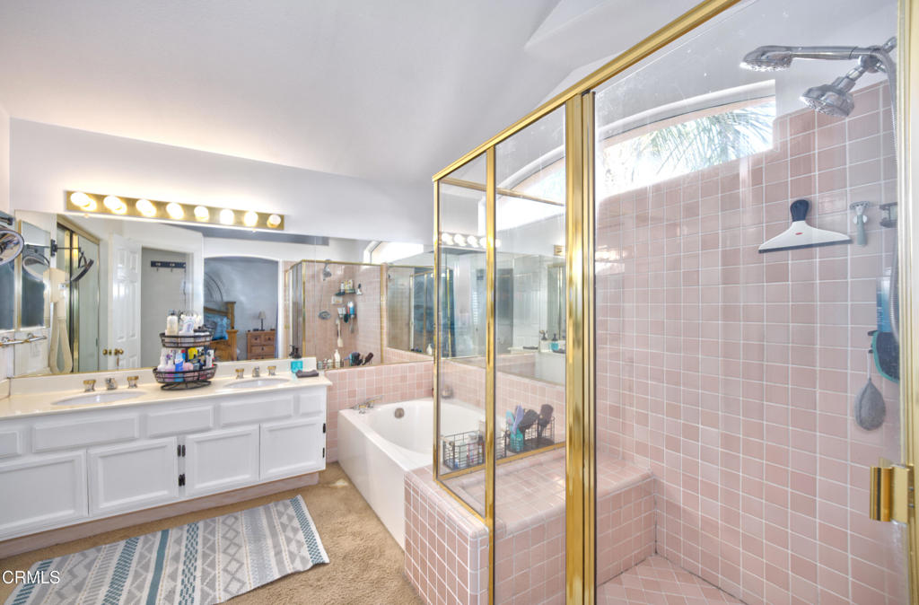 1112 Mockingbird Lane Fillmore, CA 93015 - Photo 13 of 21 a bathroom with a double vanity sink and mirror