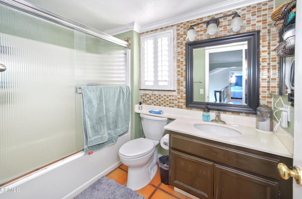 1112 Mockingbird Lane Fillmore, CA 93015 - Photo 17 of 21 a bathroom with a sink a toilet and shower