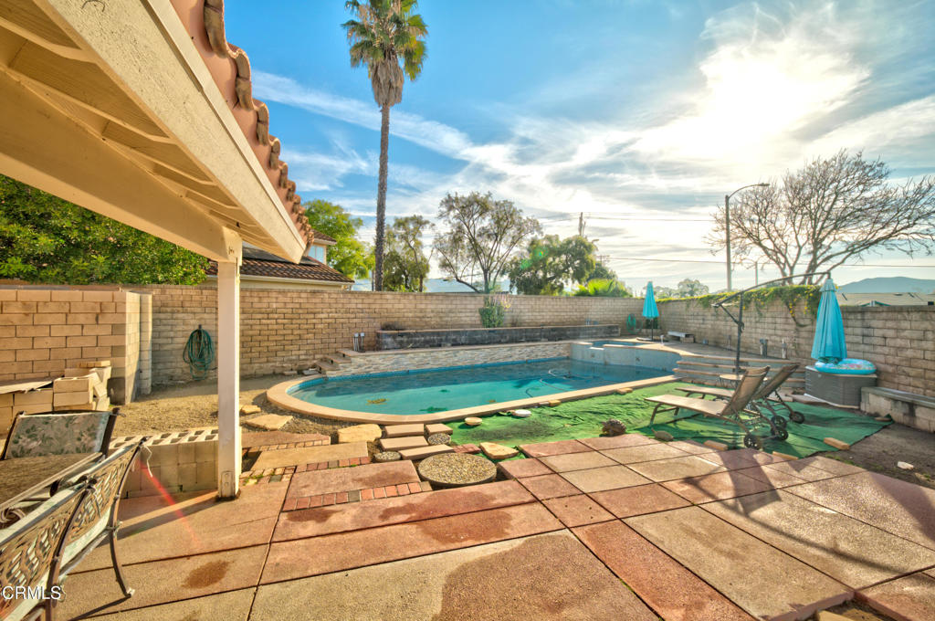1112 Mockingbird Lane Fillmore, CA 93015 - Photo 18 of 21 a view of a swimming pool with a patio