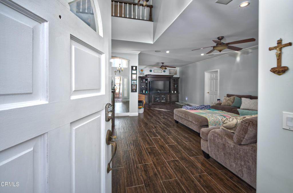 1112 Mockingbird Lane Fillmore, CA 93015 - Photo 3 of 21 a living room with furniture and a fireplace