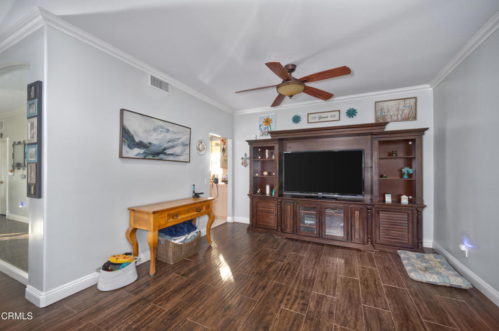 1112 Mockingbird Lane Fillmore, CA 93015 - Photo 5 of 21 a living room with furniture and a flat screen tv