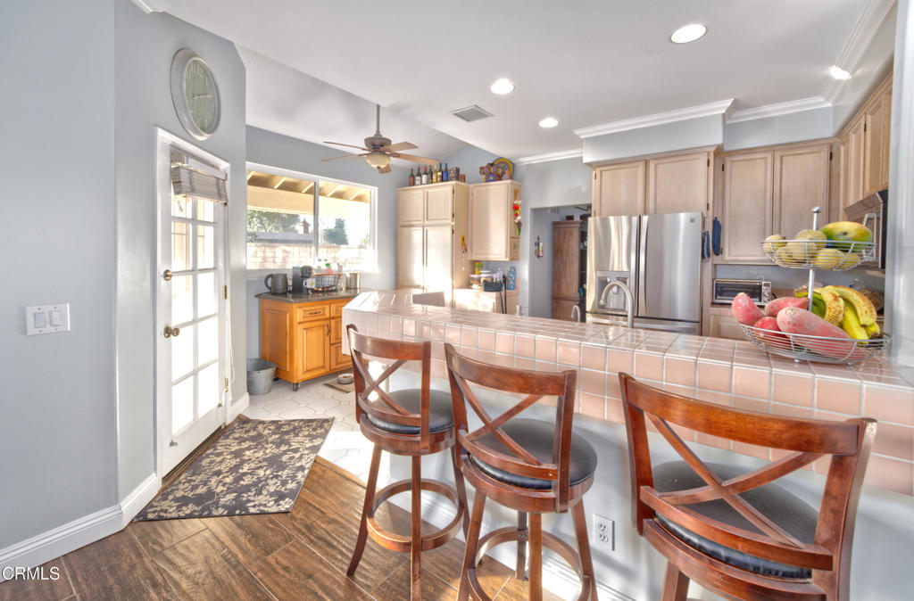 1112 Mockingbird Lane Fillmore, CA 93015 - Photo 7 of 21 a view of a kitchen and dining room