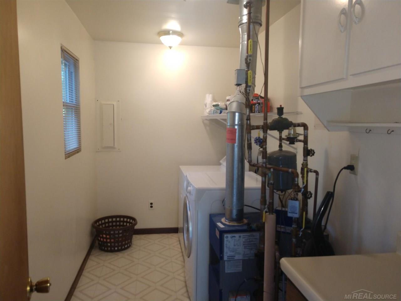 7290 Longfellow Road Lexington, MI 48450 - Photo 21 of 28 Laundry/utility room