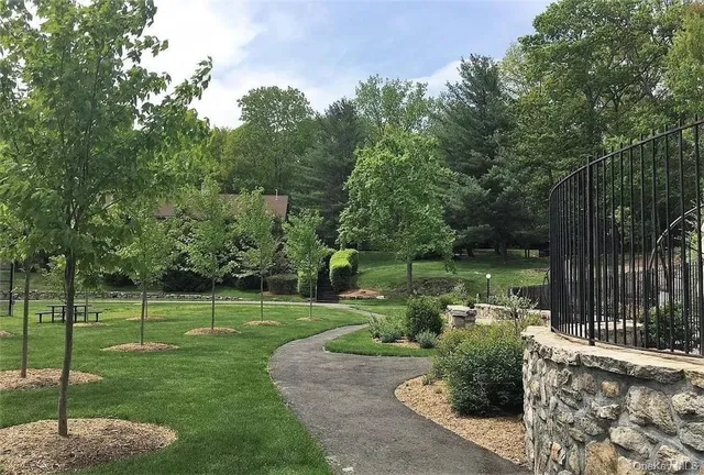 a view of a swimming pool from a balcony