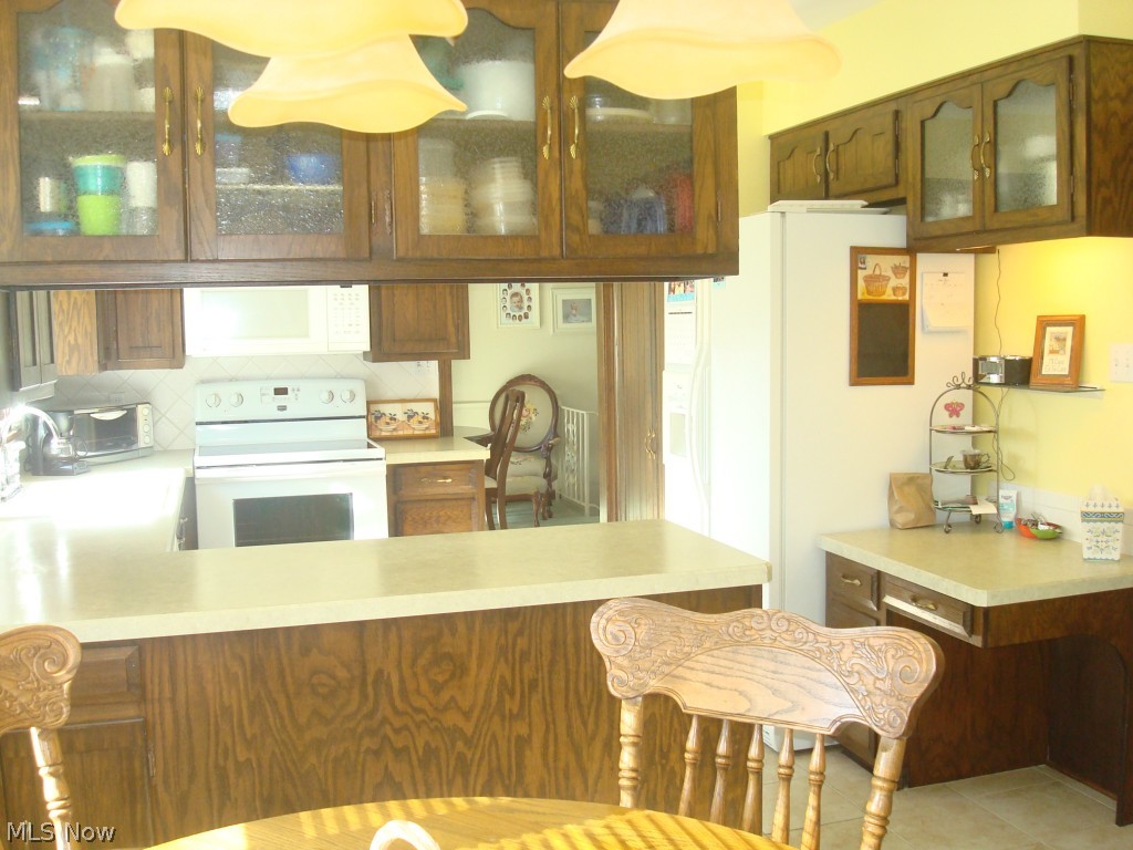 4626 Christman Road Green, OH 44319 - Photo 16 of 22 Plenty of natural light. Lots of cabinet and counter space