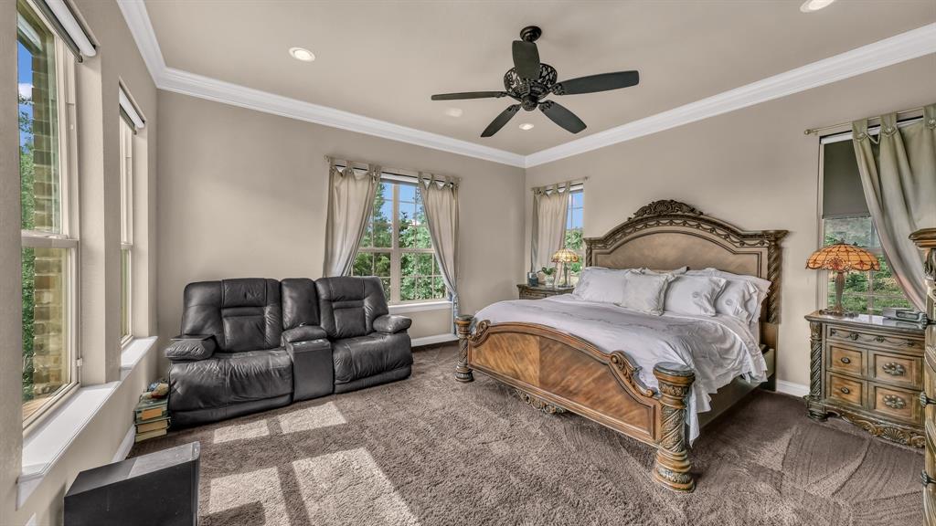 840 Hensley Road Gordon, TX 76453 - Photo 21 of 40 Bedroom featuring ornamental molding, carpet flooring, and recessed lighting