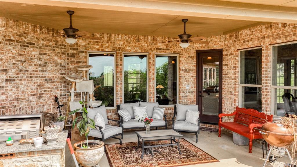 840 Hensley Road Gordon, TX 76453 - Photo 35 of 40 View of patio / terrace featuring outdoor lounge area and a ceiling fan