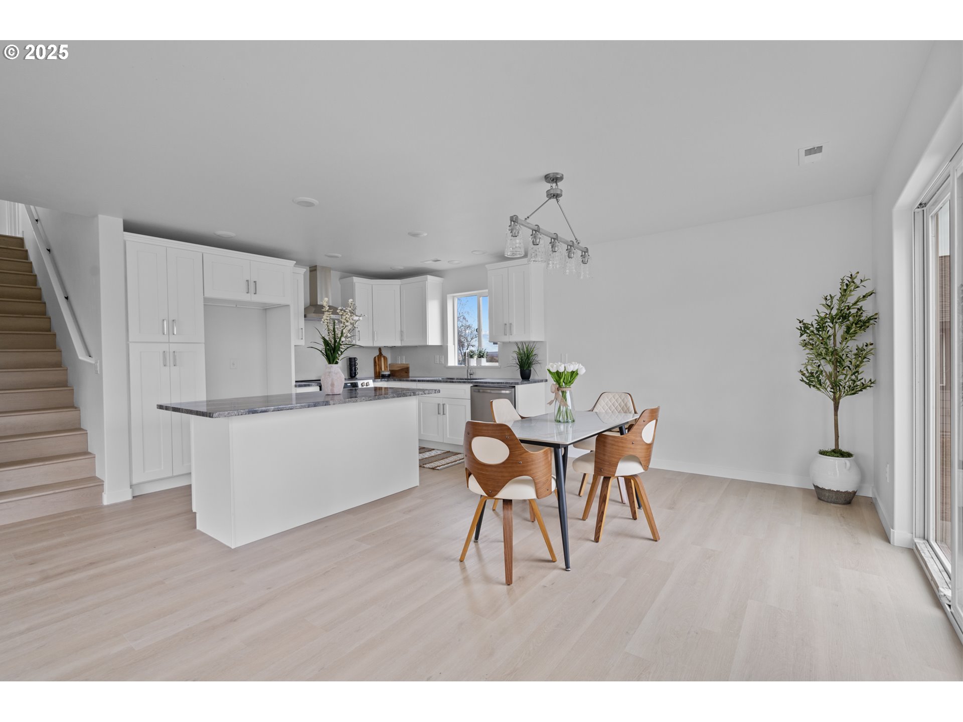 360 Southeast 4th Street Irrigon, OR 97844 - Photo 24 of 36 a kitchen with a table and chairs