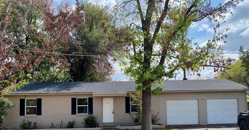 100 Burl Street Corinth, TX 76208 - Photo 15 of 16 a front view of a house with trees