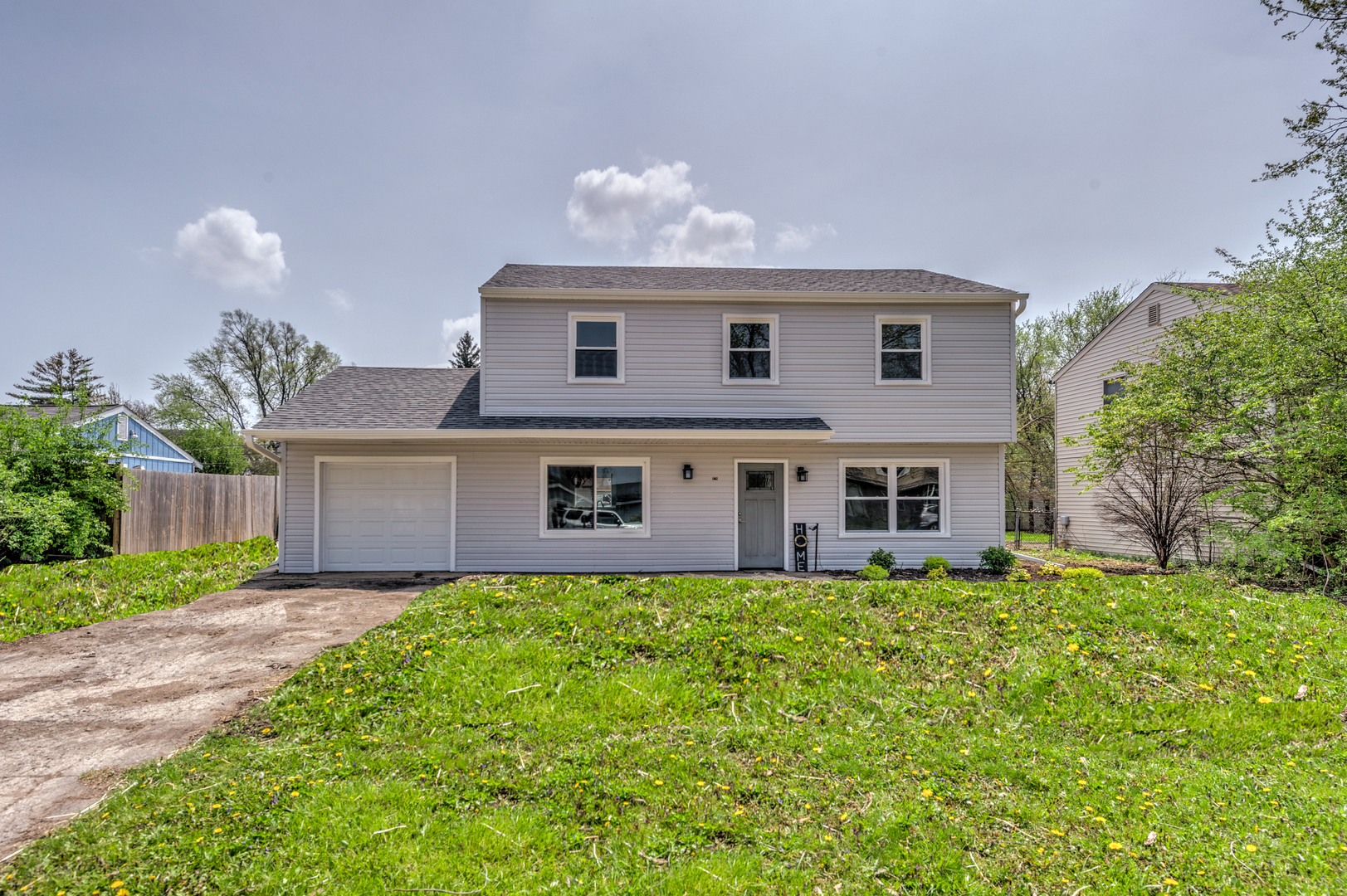 178 Queenswood Road Bolingbrook, IL 60440 - Photo 1 of 26 a big house with a big yard and large trees