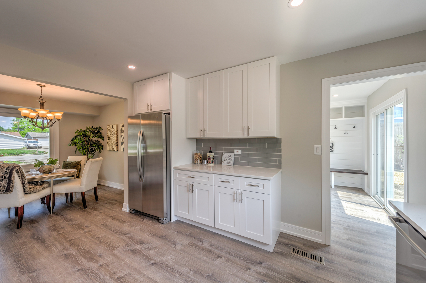 178 Queenswood Road Bolingbrook, IL 60440 - Photo 11 of 26 a kitchen with stainless steel appliances a refrigerator and wooden cabinets