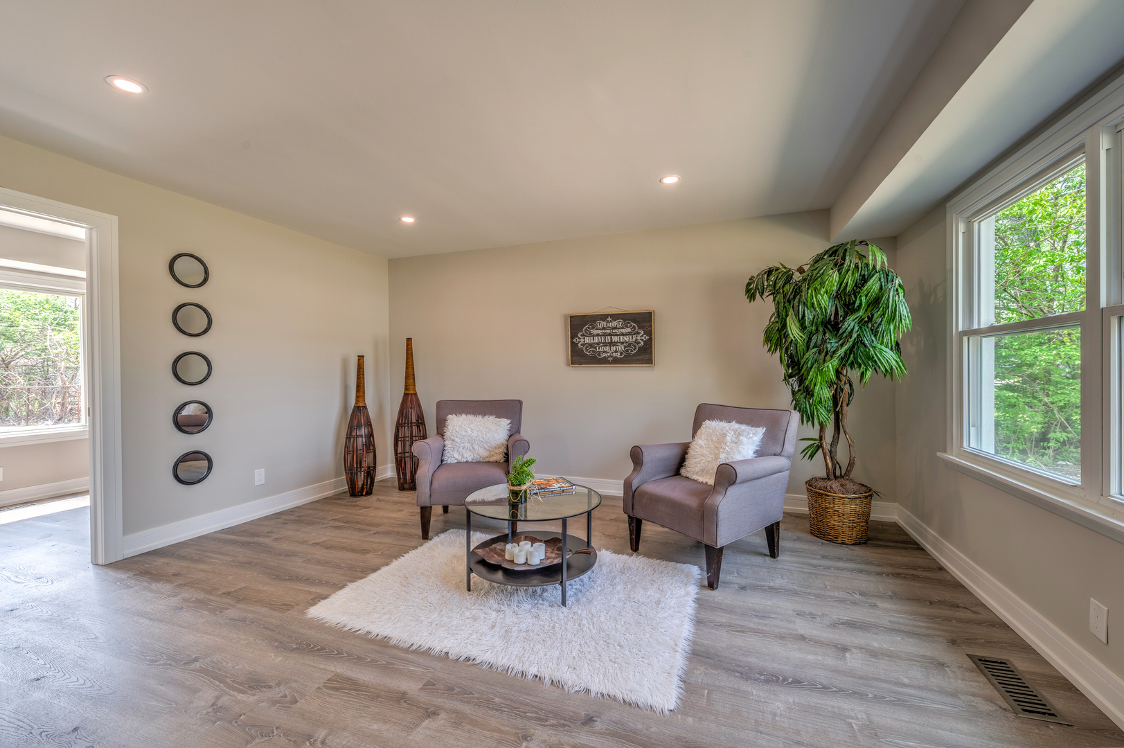 178 Queenswood Road Bolingbrook, IL 60440 - Photo 14 of 26 a living room with furniture and a large window