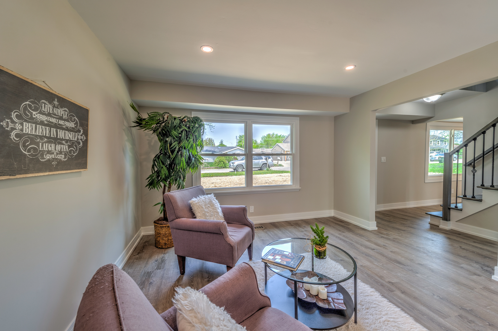 178 Queenswood Road Bolingbrook, IL 60440 - Photo 15 of 26 a living room with furniture and a window