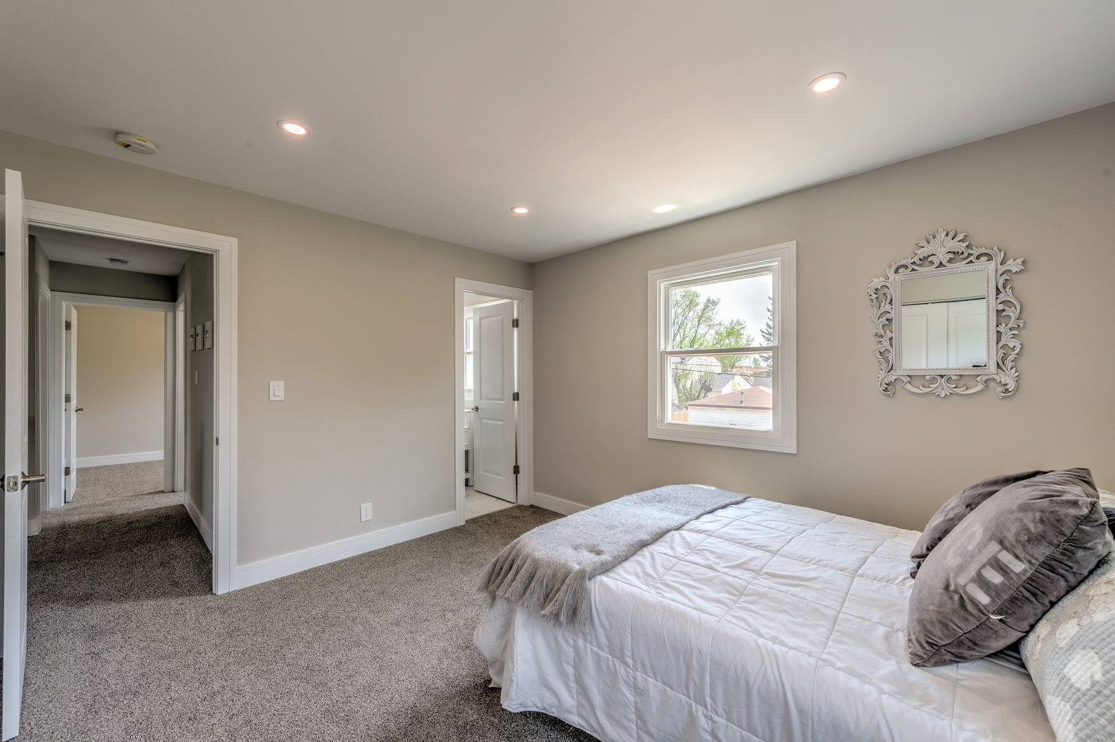 178 Queenswood Road Bolingbrook, IL 60440 - Photo 18 of 26 a bedroom with a bed and a window