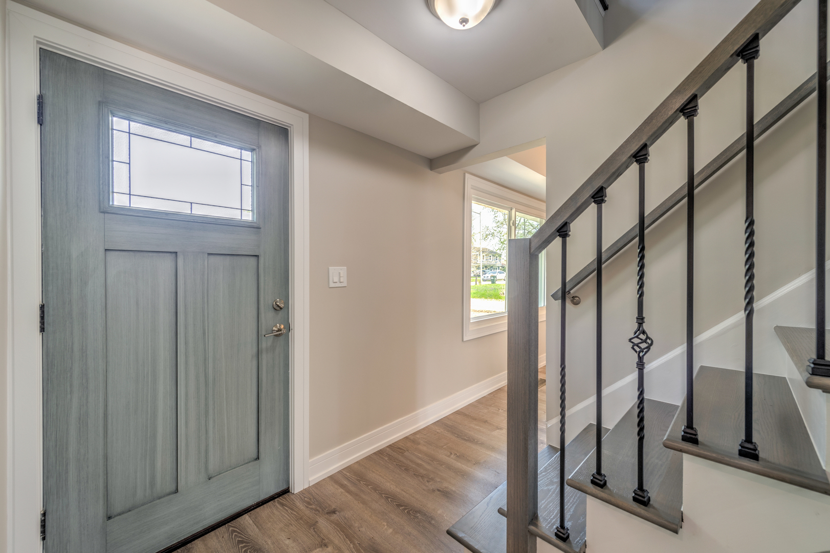 178 Queenswood Road Bolingbrook, IL 60440 - Photo 2 of 26 a view of an entryway with wooden floor