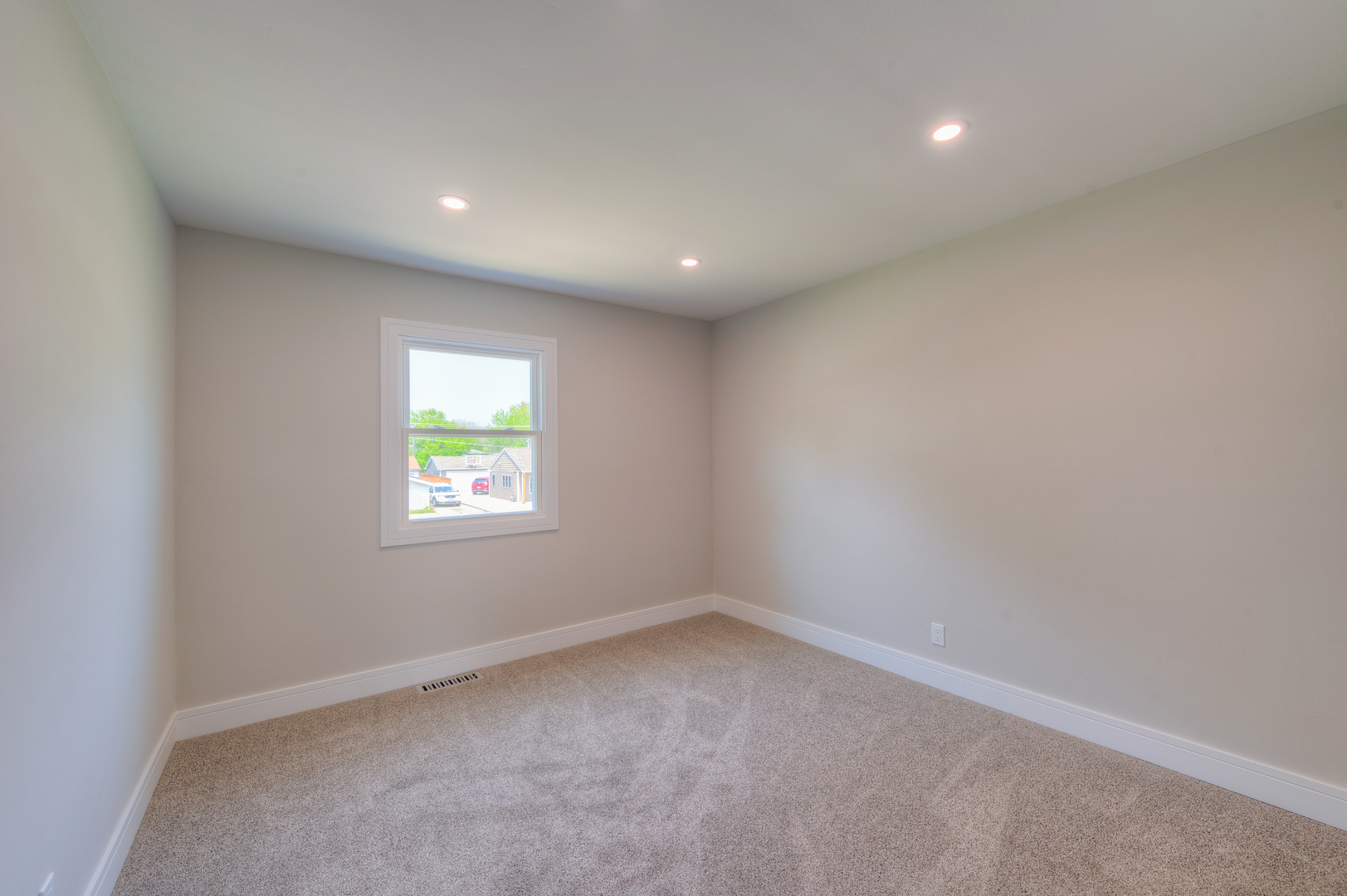 178 Queenswood Road Bolingbrook, IL 60440 - Photo 23 of 26 an empty room with a window