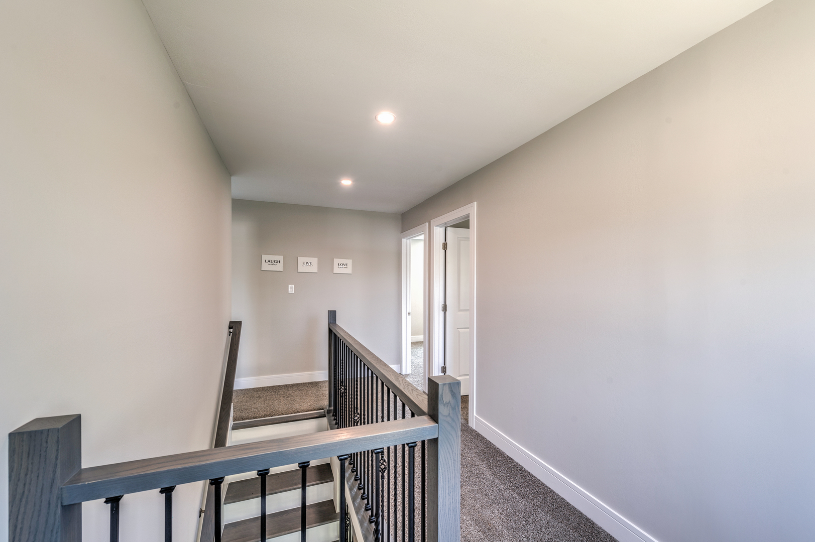 178 Queenswood Road Bolingbrook, IL 60440 - Photo 25 of 26 a view of a hallway with staircase