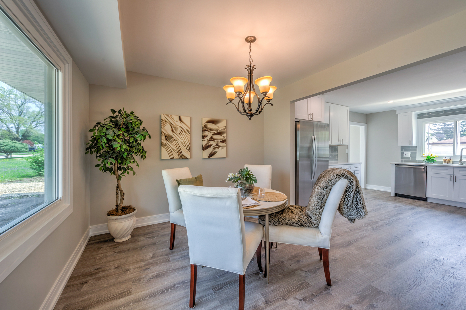 178 Queenswood Road Bolingbrook, IL 60440 - Photo 5 of 26 a view of a dining room with furniture window and wooden floor
