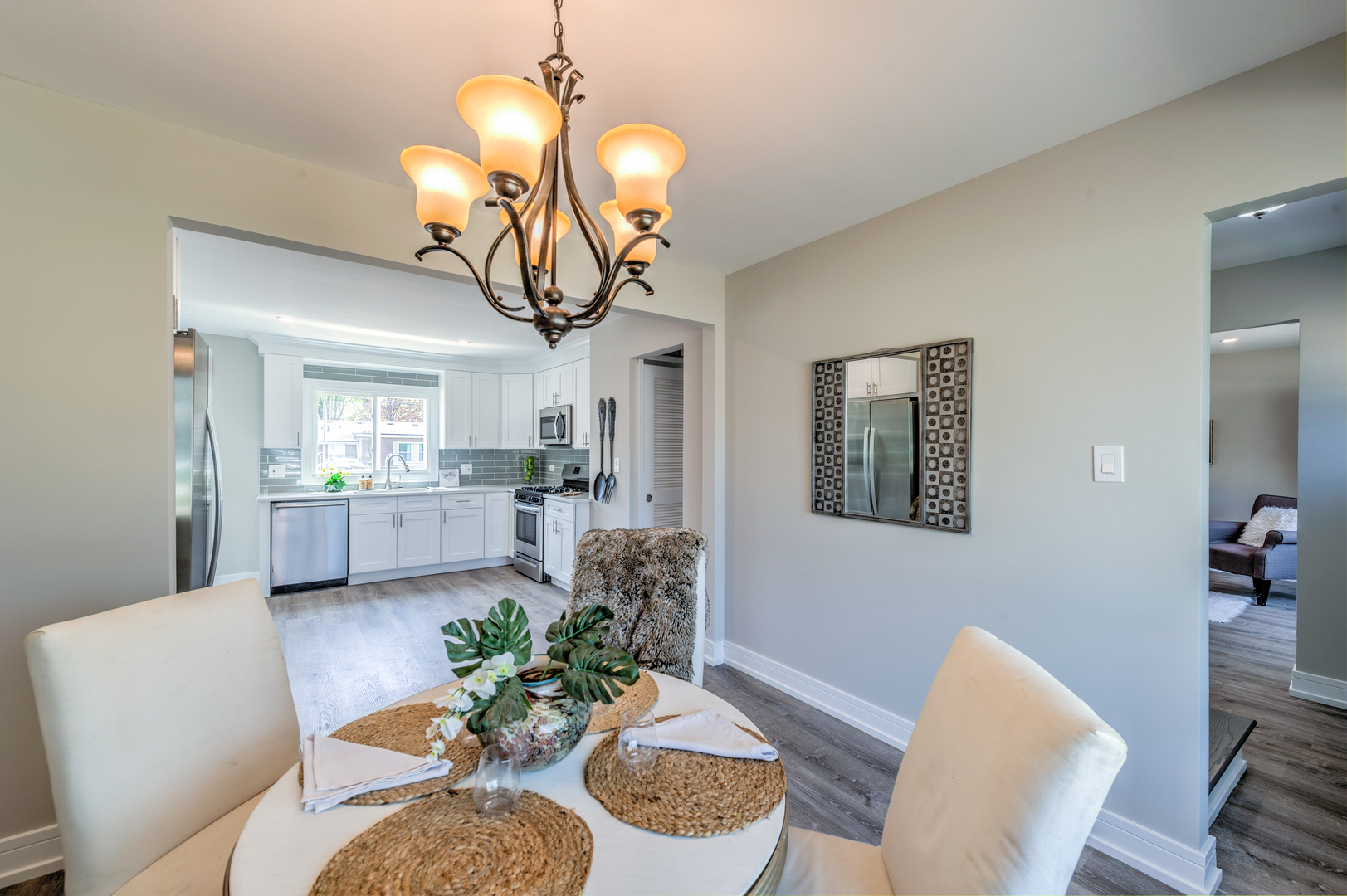 178 Queenswood Road Bolingbrook, IL 60440 - Photo 6 of 26 a view of a livingroom with furniture and a chandelier