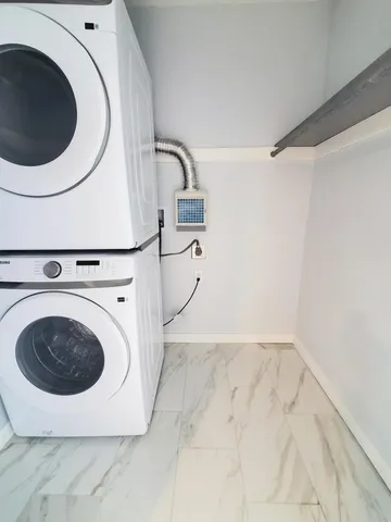 a view of balcony with wooden floor