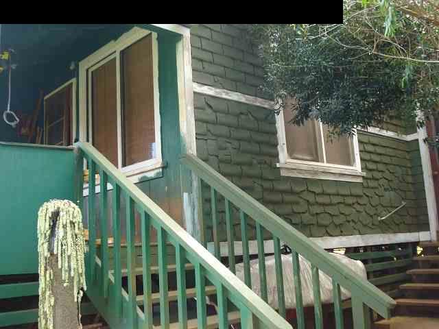 675 Mopua Street Haiku, HI 96708 - Photo 3 of 18 a balcony with wooden floor and outdoor space