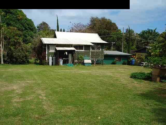 675 Mopua Street Haiku, HI 96708 - Photo 8 of 18 a view of a house with garden