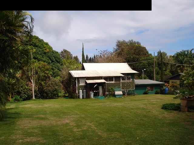 675 Mopua Street Haiku, HI 96708 - Photo 9 of 18 a view of a house with a garden