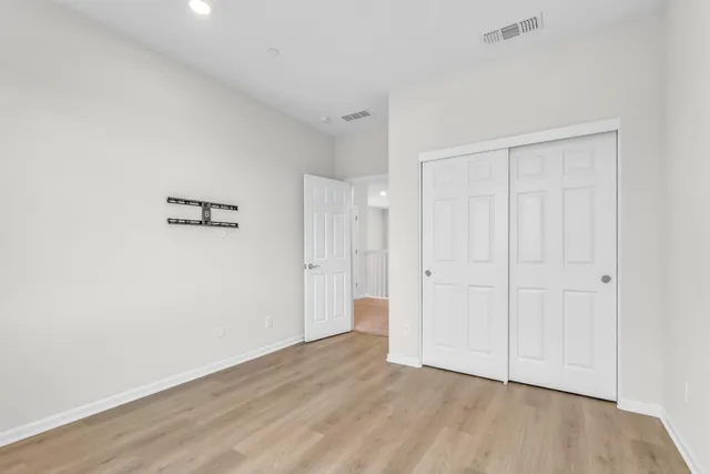 a bathroom with double vanity sink and mirror