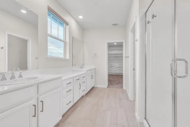 a building outdoor space with patio furniture and garden